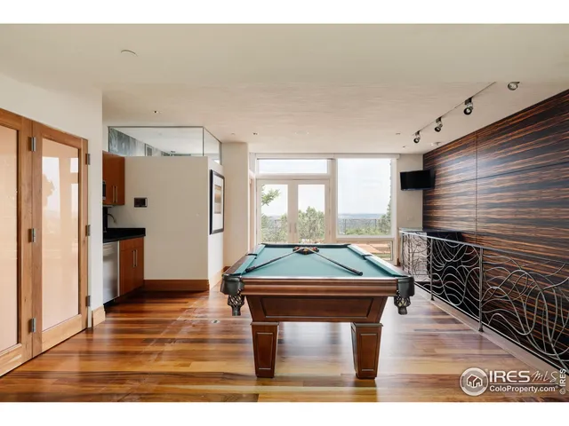 a room with furniture and a wooden floor