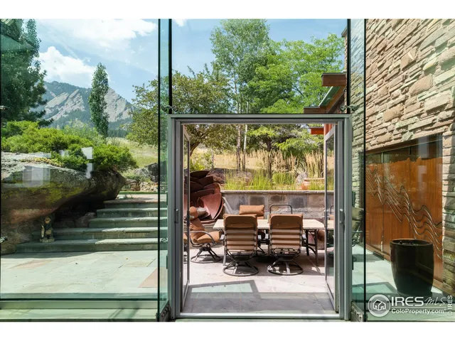 a view of a back yard from a balcony