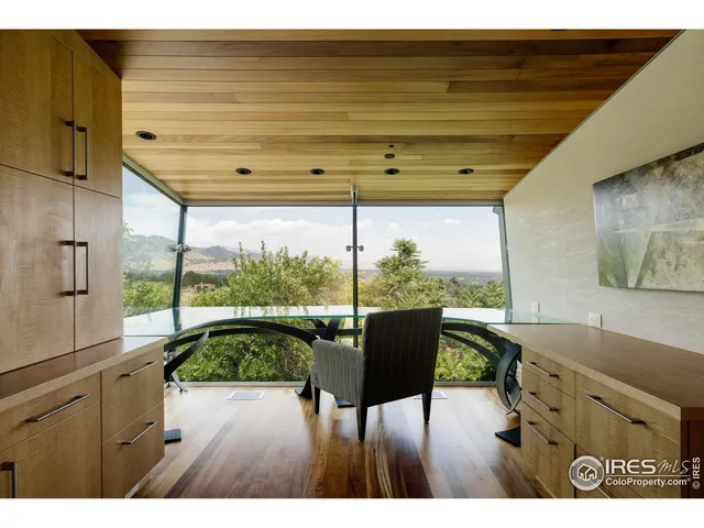 a workspace with furniture and window