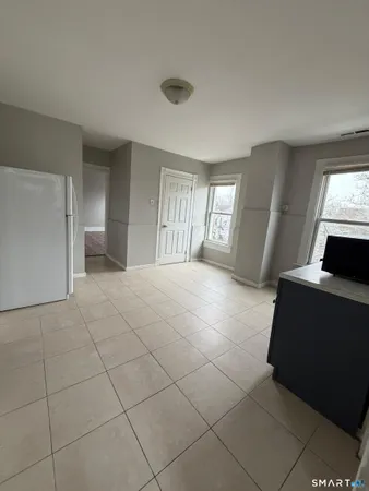 a view of a livingroom with a staircase