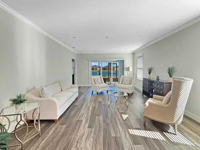 a living room with furniture and a table