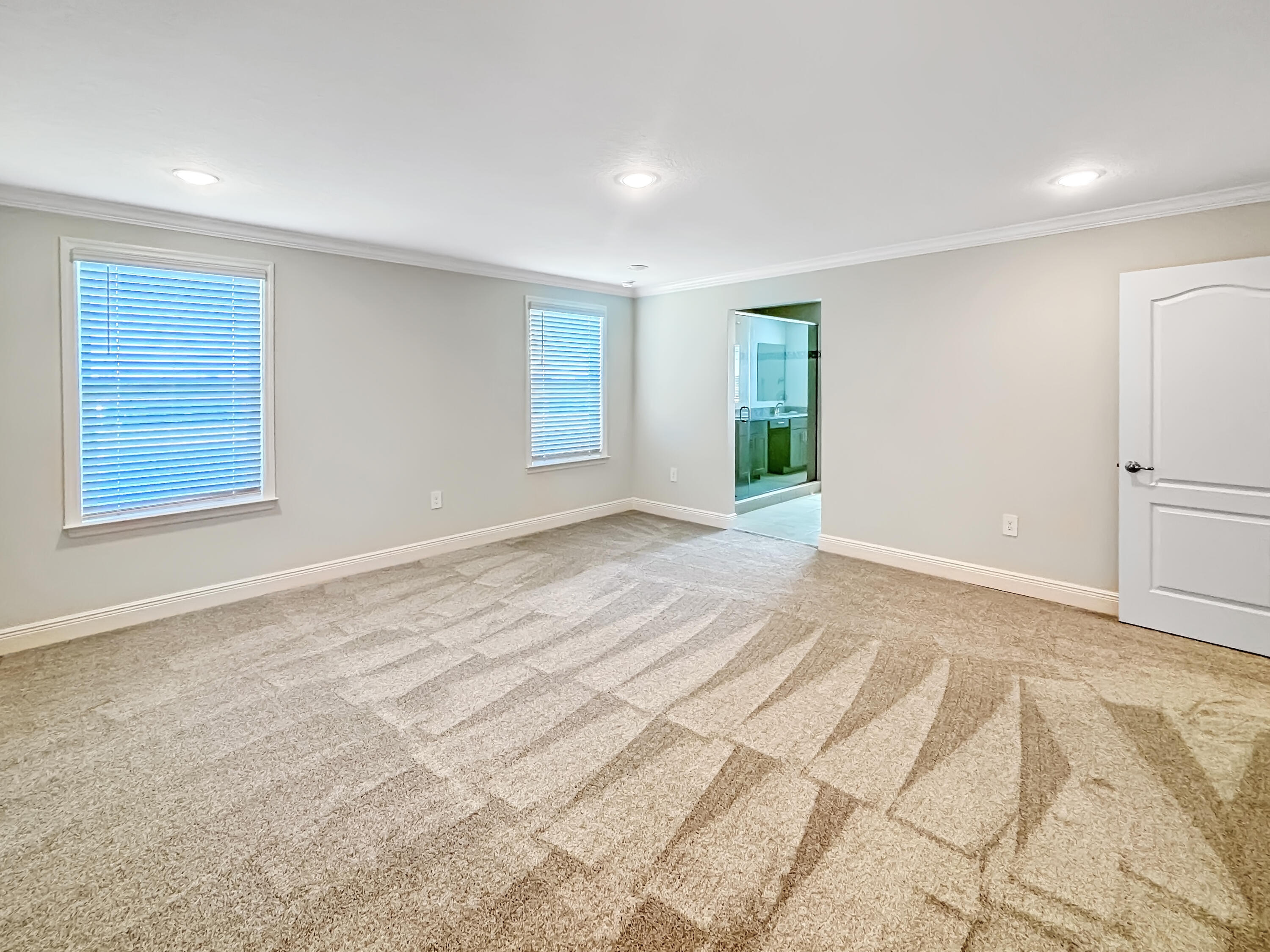 9399 Southwest Serapis Way Port Port St. Lucie, FL 34987 - Photo 16 of 43 a view of an empty room with a window