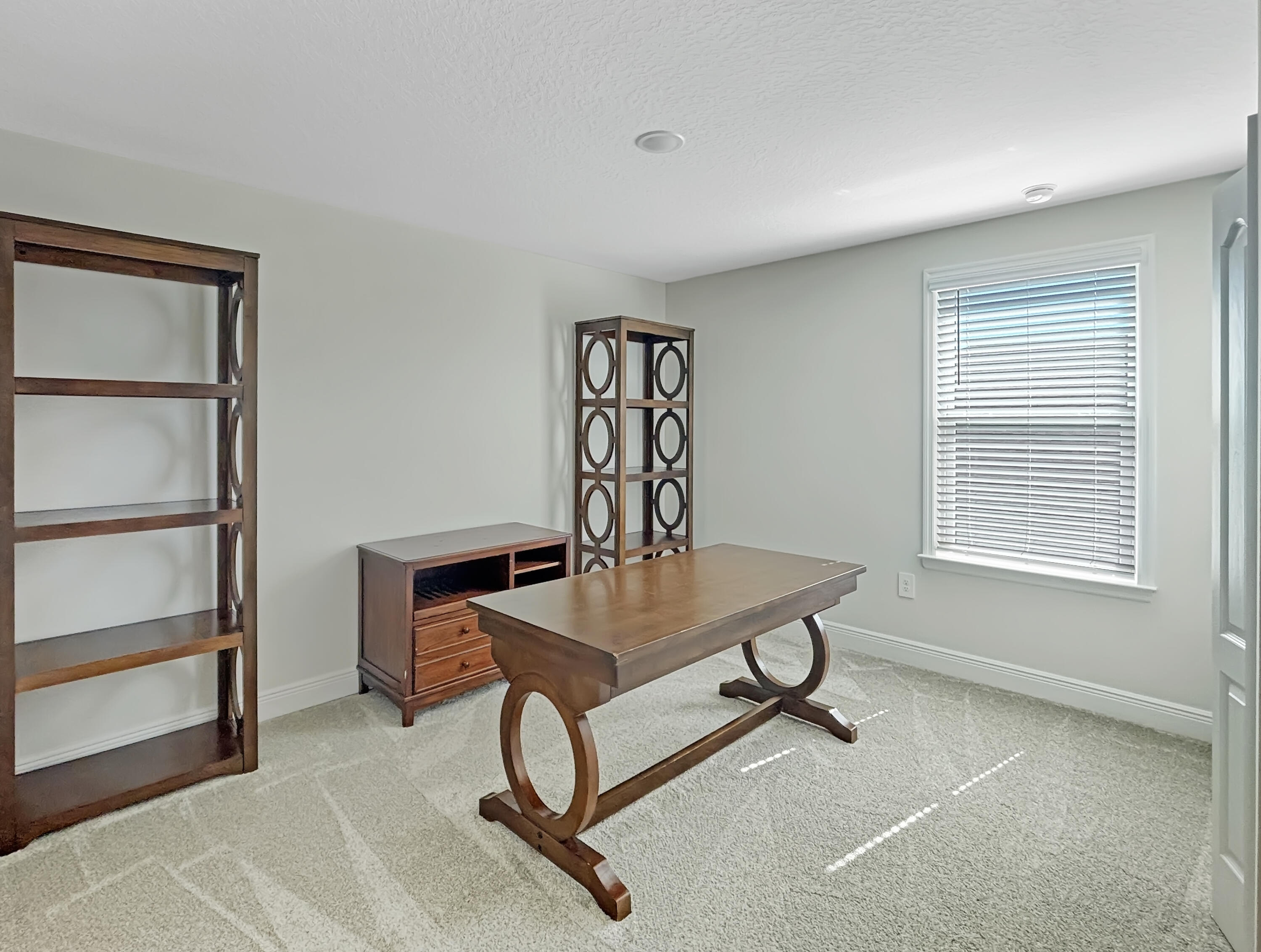 9399 Southwest Serapis Way Port Port St. Lucie, FL 34987 - Photo 22 of 43 a living room with furniture