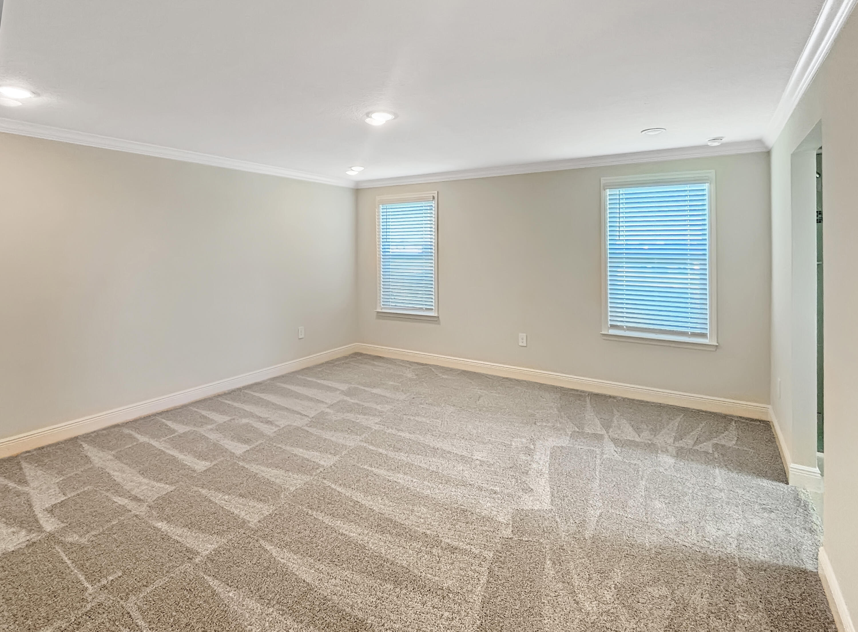 9399 Southwest Serapis Way Port Port St. Lucie, FL 34987 - Photo 23 of 43 a view of an empty room with a window