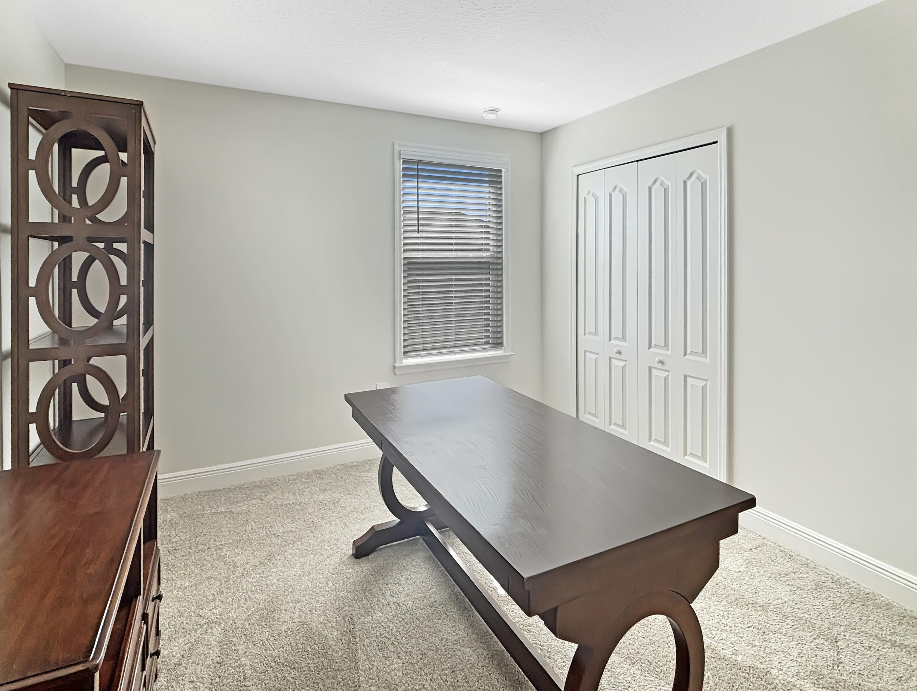 9399 Southwest Serapis Way Port Port St. Lucie, FL 34987 - Photo 25 of 43 a living room with furniture
