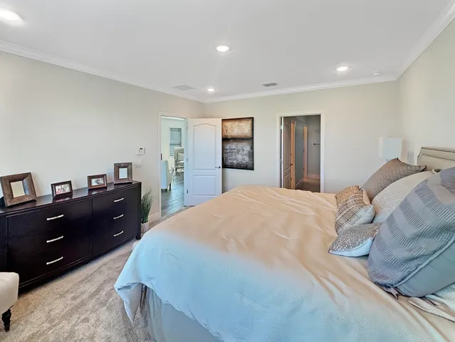 a bed room with a bed and a television