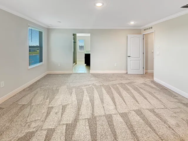 a view of an empty room and window