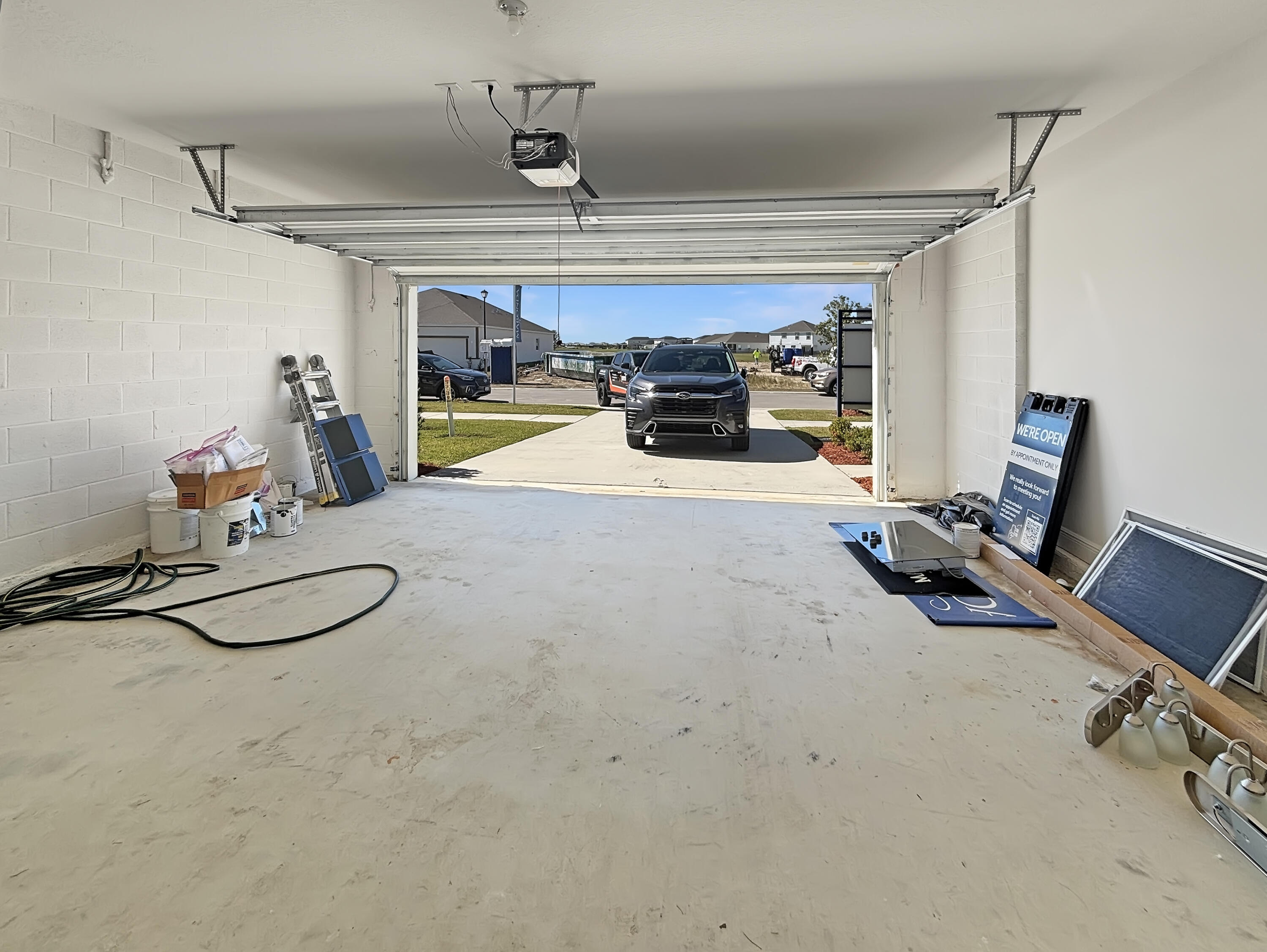 9399 Southwest Serapis Way Port Port St. Lucie, FL 34987 - Photo 40 of 43 a view of a room with gym equipment