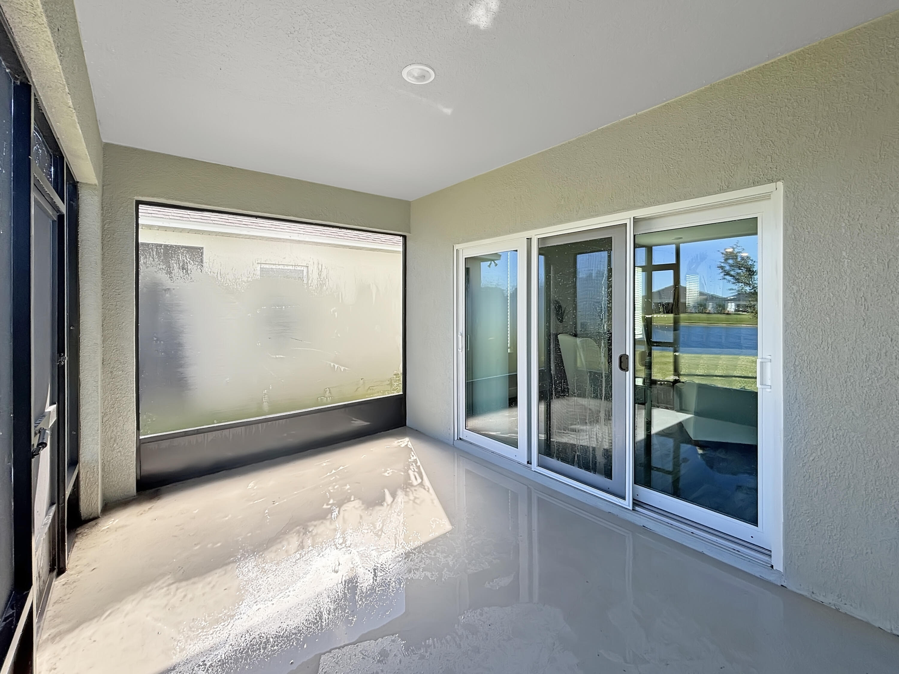 9399 Southwest Serapis Way Port Port St. Lucie, FL 34987 - Photo 42 of 43 a view of empty room with window