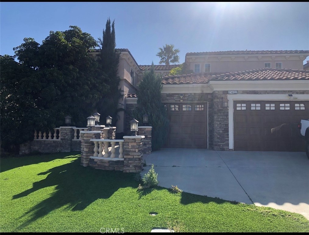 23422 Camino Terraza Road Corona, CA 92883 - Photo 1 of 47 a view of a chairs and table in backyard