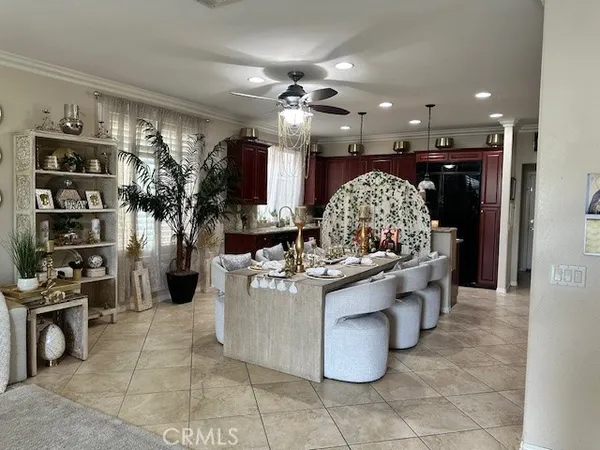 a kitchen with stainless steel appliances granite countertop a stove and a refrigerator