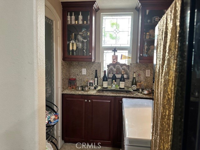 23422 Camino Terraza Road Corona, CA 92883 - Photo 19 of 47 a kitchen with a sink and cabinets