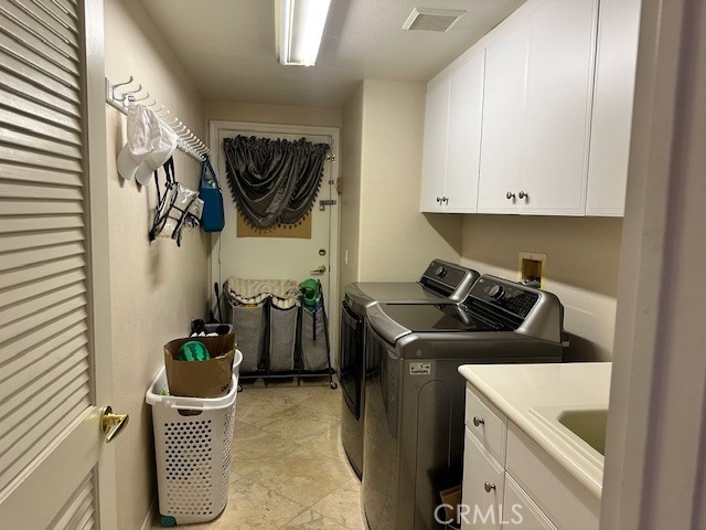 23422 Camino Terraza Road Corona, CA 92883 - Photo 20 of 47 a kitchen with a stove and a refrigerator