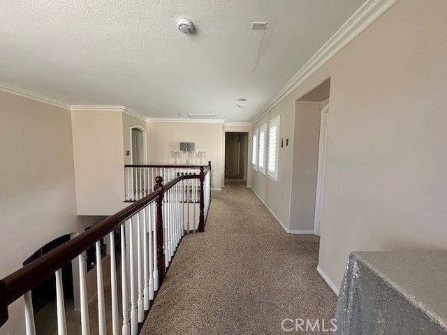 23422 Camino Terraza Road Corona, CA 92883 - Photo 25 of 47 a view of a hallway with stairs