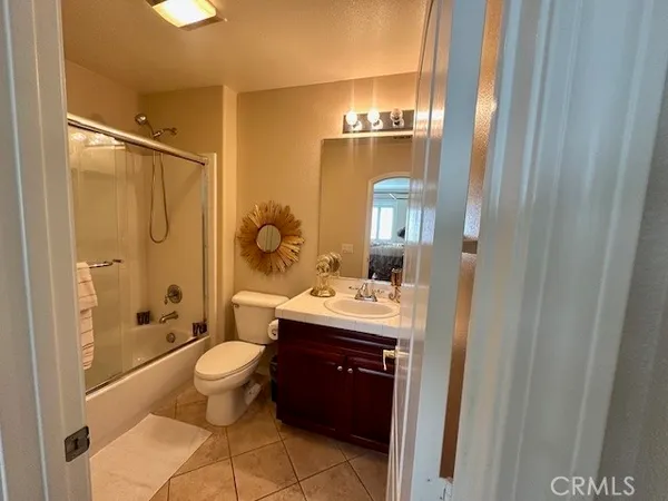 a view of a house with swimming pool and sitting area