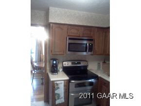 481 Howardsville Road Staunton, VA 24401 - Photo 13 of 15 a kitchen with a stove and a microwave