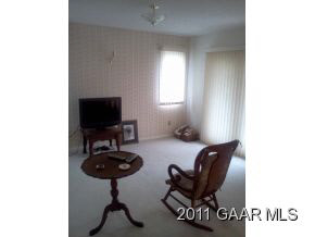 481 Howardsville Road Staunton, VA 24401 - Photo 15 of 15 a living room with furniture and a flat screen tv