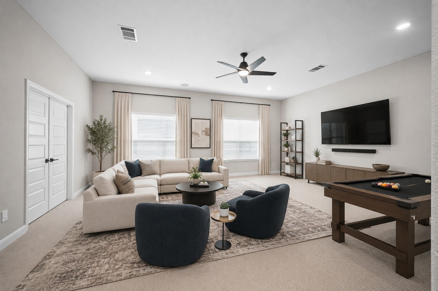 4923 Grapevine Lane Manvel, TX 77578 - Photo 30 of 49 a living room with furniture and a flat screen tv