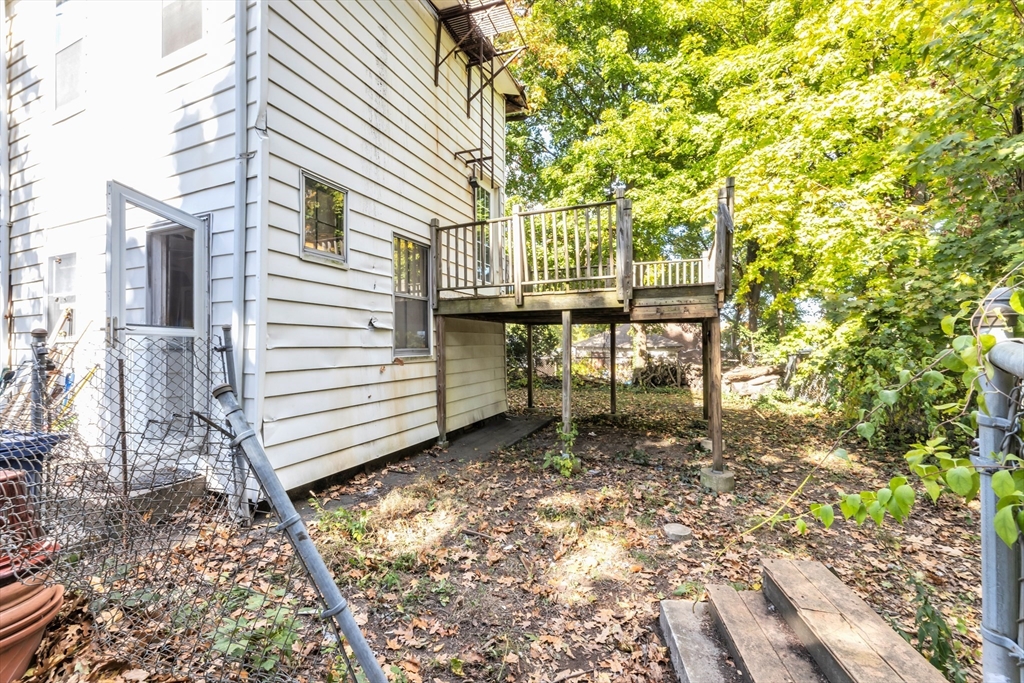 54 Oak Street Boston, MA 02136 - Photo 11 of 13 a view of a chair and table in backyard