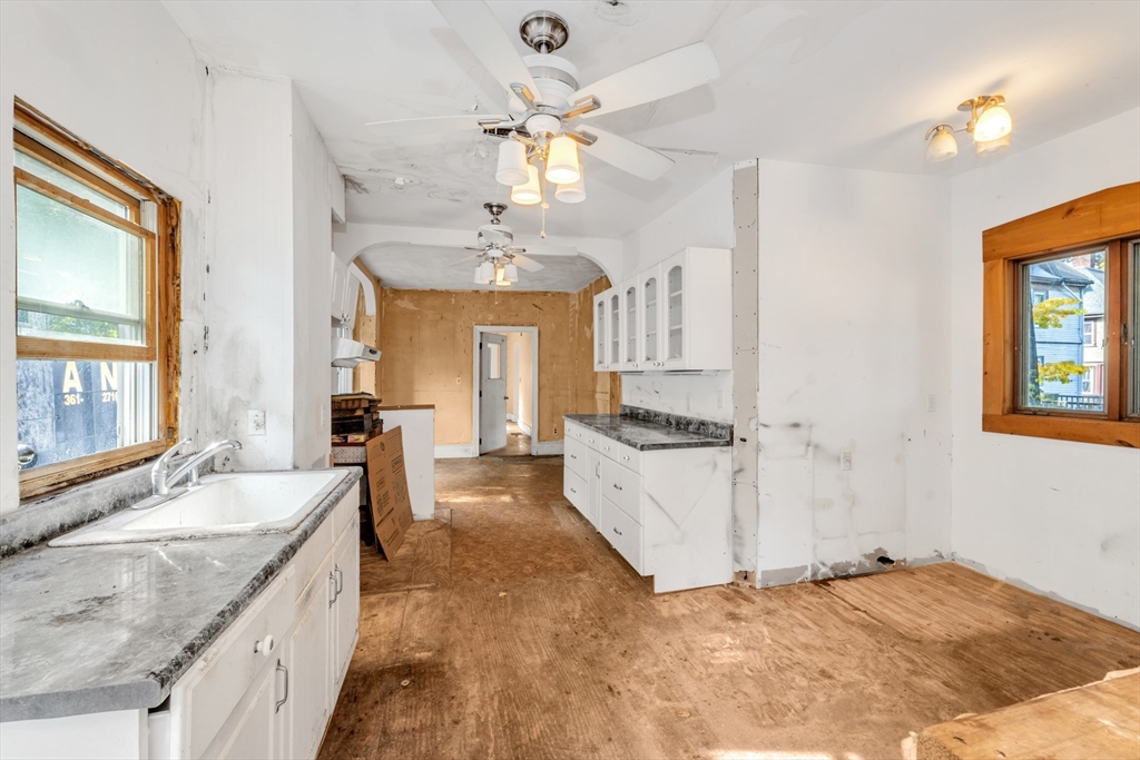 54 Oak Street Boston, MA 02136 - Photo 6 of 13 a large spacious bathroom with a granite countertop double vanity sink a mirror and a bathtub