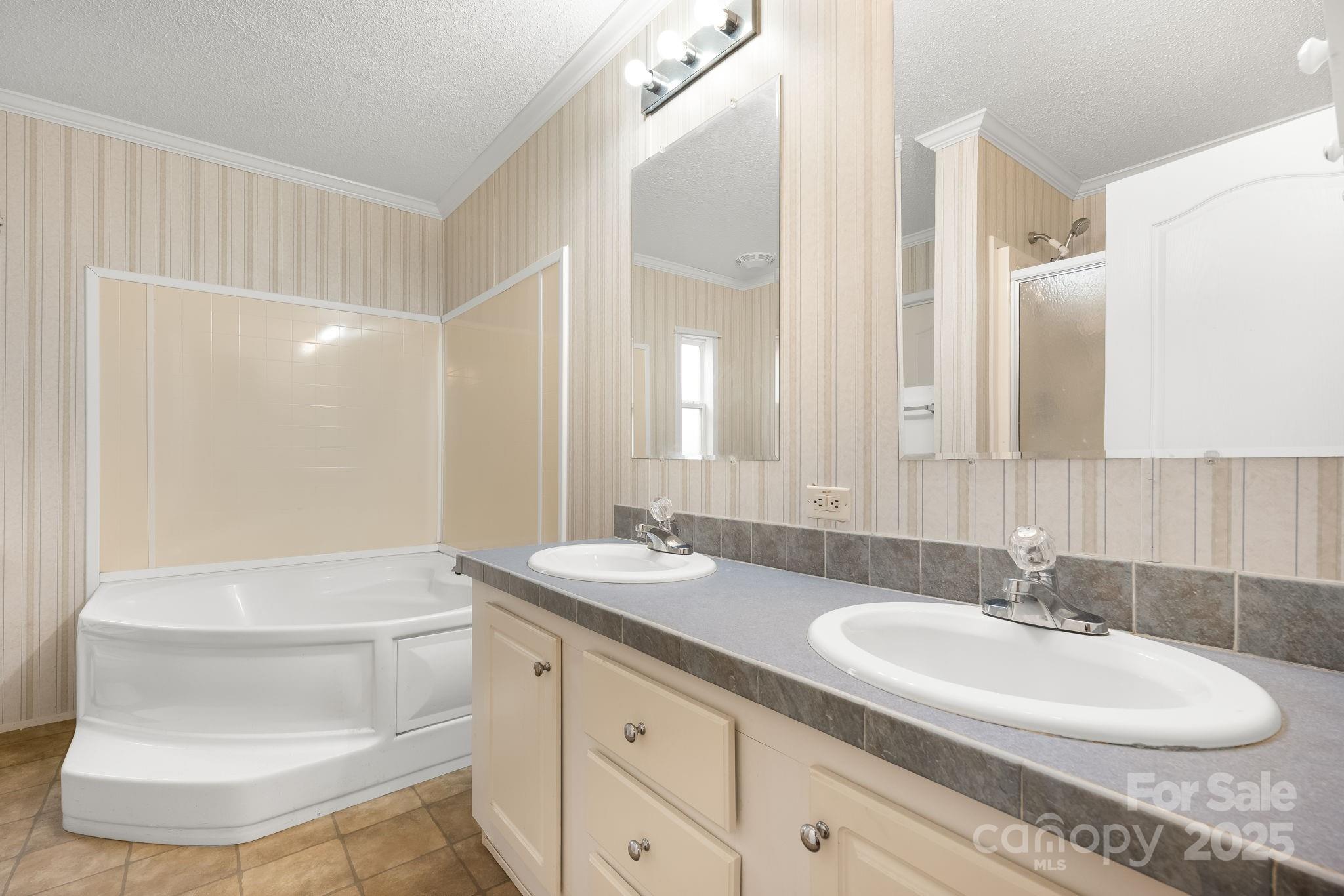 6351 Pleasant Grove Church Road Kannapolis, NC 28081 - Photo 13 of 21 a bathroom with a double vanity sink and a mirror