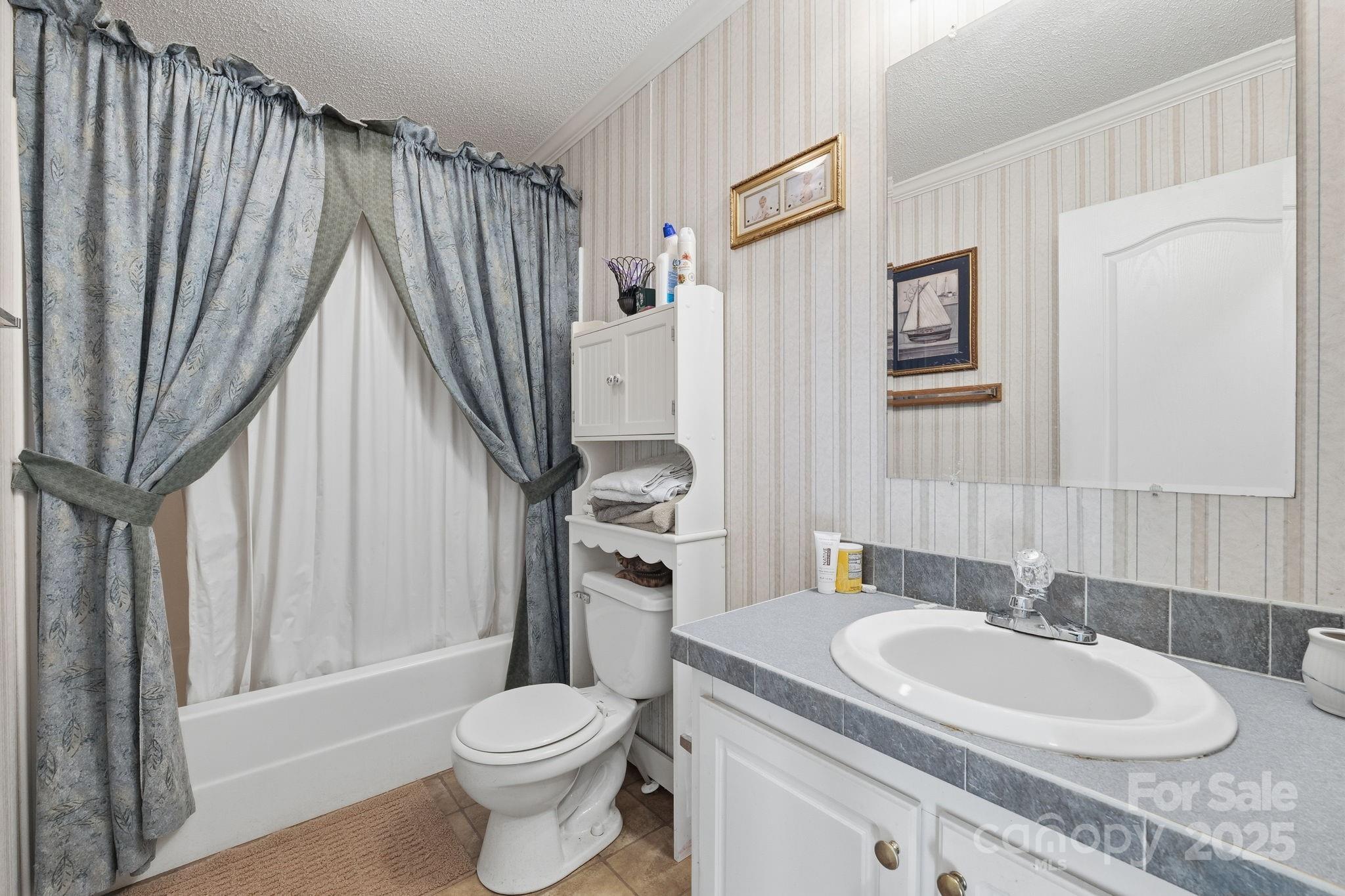 6351 Pleasant Grove Church Road Kannapolis, NC 28081 - Photo 18 of 24 a bathroom with a granite countertop sink toilet and shower