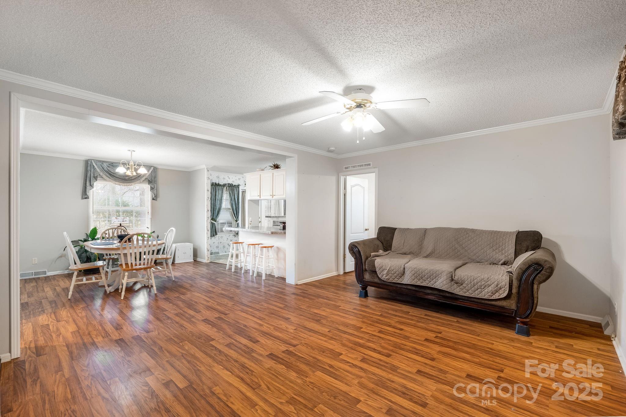 6351 Pleasant Grove Church Road Kannapolis, NC 28081 - Photo 6 of 21 a living room with furniture and wooden floor