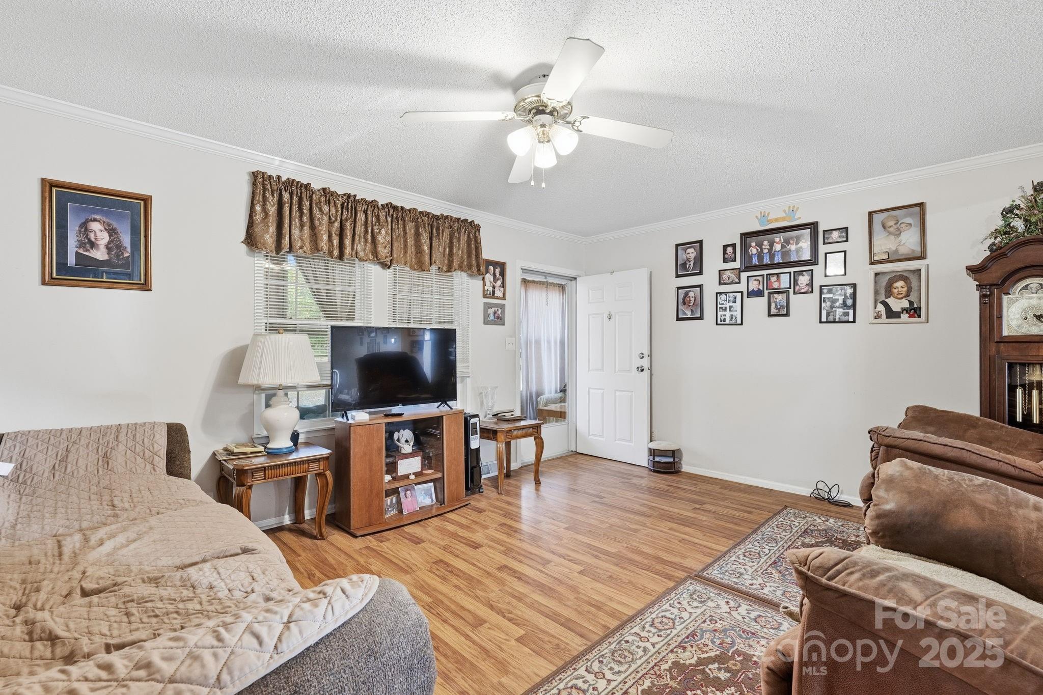 6351 Pleasant Grove Church Road Kannapolis, NC 28081 - Photo 7 of 24 a living room with furniture and a flat screen tv