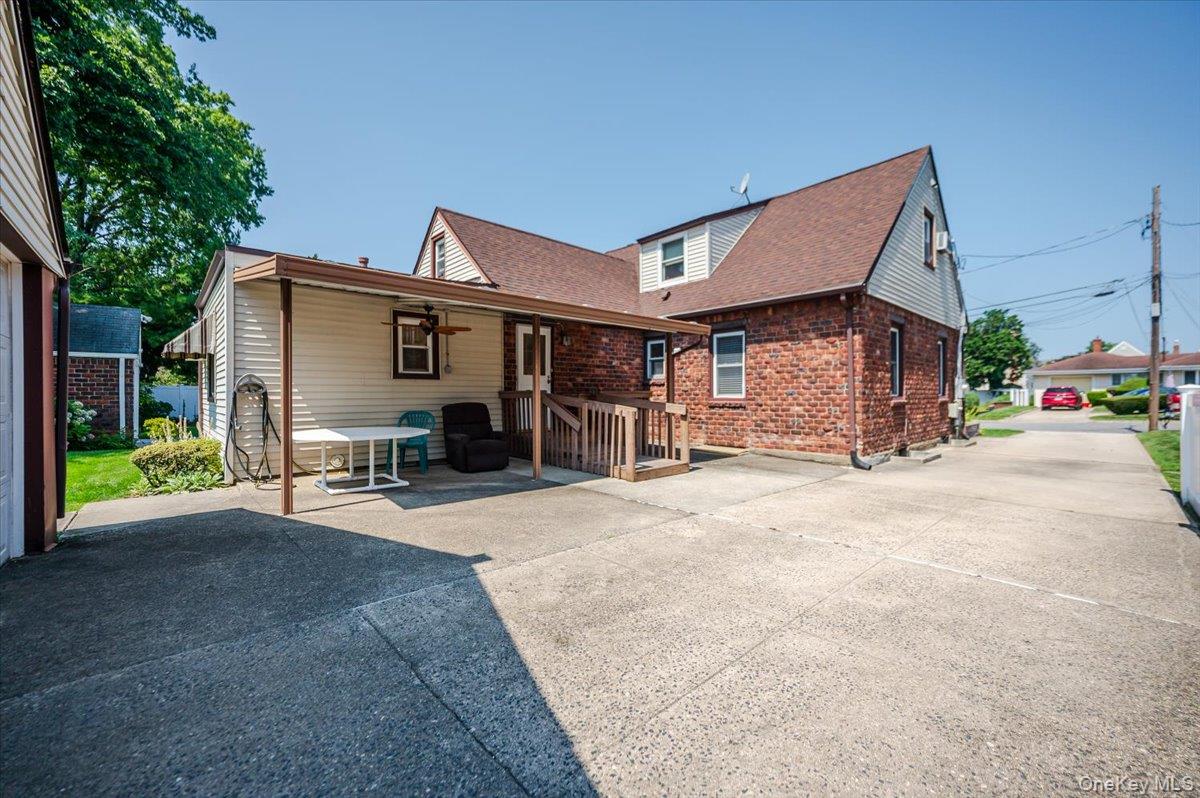 715 Iris Street Franklin Square, NY 11010 - Photo 20 of 20 a view of a house with sitting area