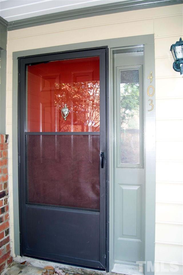403 Broad Leaf Circle, Unit 403 Raleigh, NC 27613 - Photo 1 of 25 a view of front door