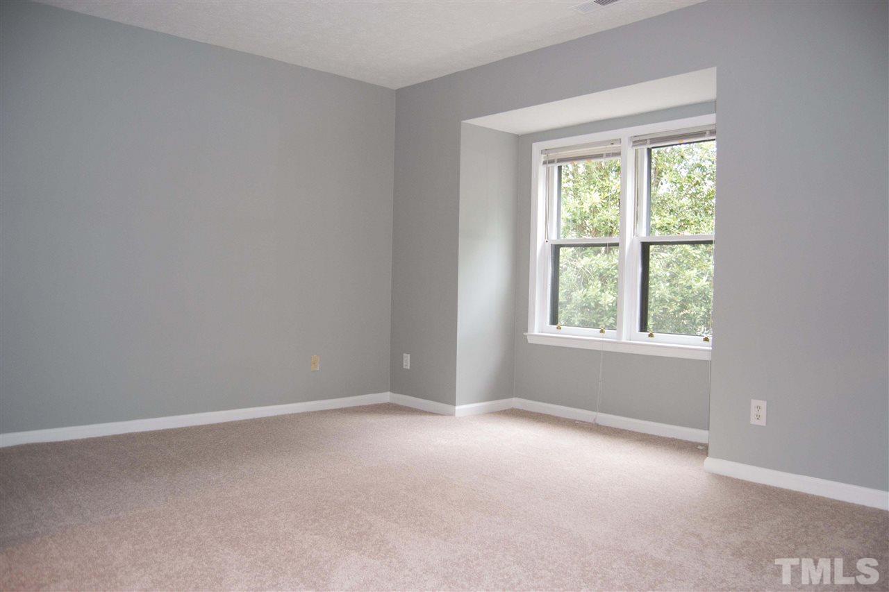 403 Broad Leaf Circle, Unit 403 Raleigh, NC 27613 - Photo 13 of 25 an empty room with a window