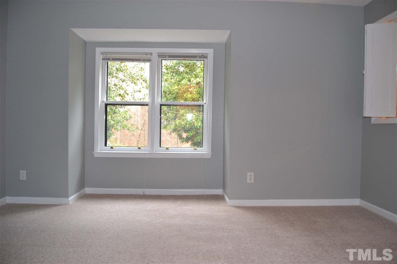 403 Broad Leaf Circle, Unit 403 Raleigh, NC 27613 - Photo 14 of 25 an empty room with a window