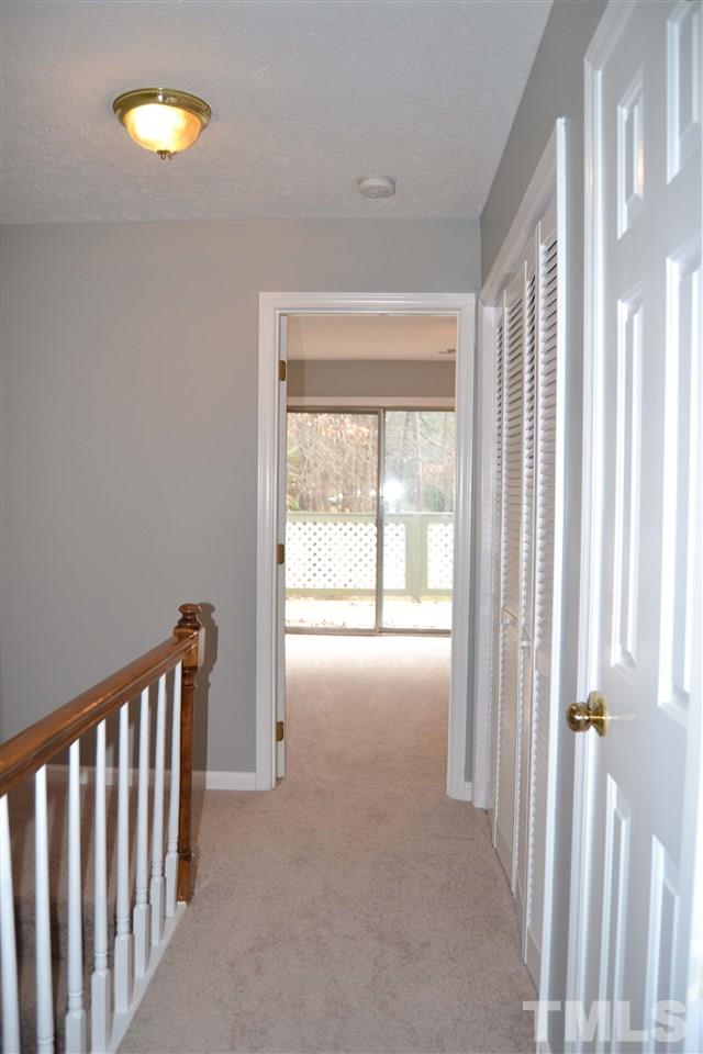 403 Broad Leaf Circle, Unit 403 Raleigh, NC 27613 - Photo 18 of 25 a view of empty room with floor to ceiling window