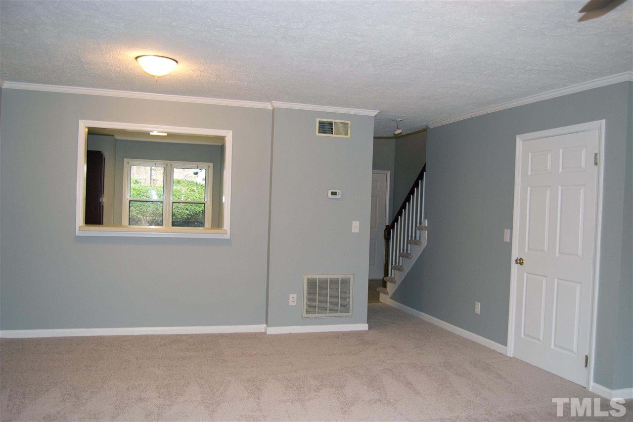 403 Broad Leaf Circle, Unit 403 Raleigh, NC 27613 - Photo 3 of 25 a view of an entryway with staircase