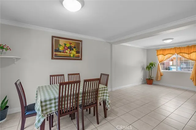 a view of a livingroom with furniture and a window