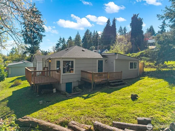 a house view with a backyard space