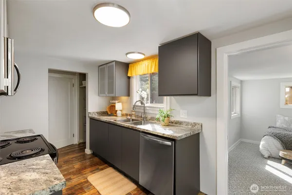 a en suite bathroom with a sink and a mirror