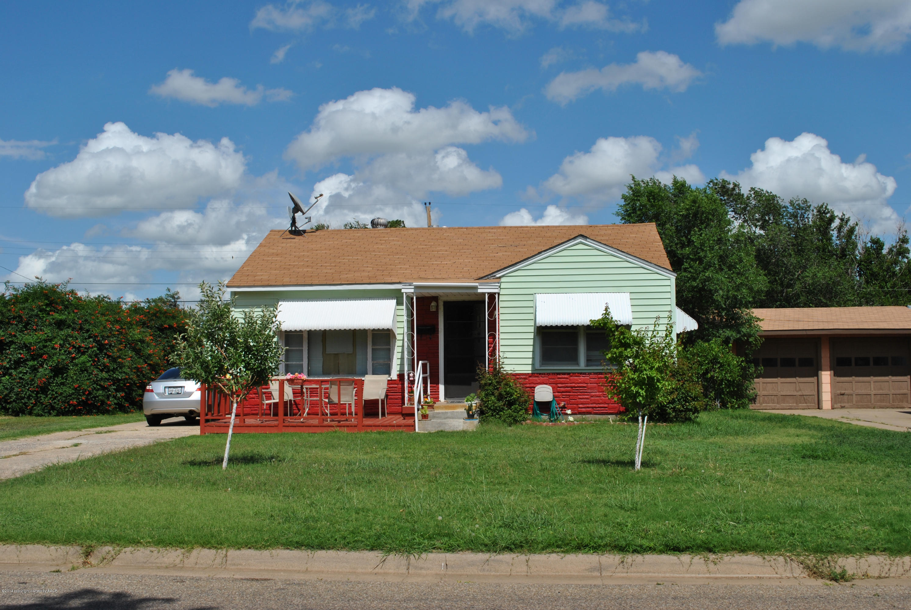4625 Cline Road Amarillo, TX 79110 - Photo 1 of 16 a front view of house with yard and green space
