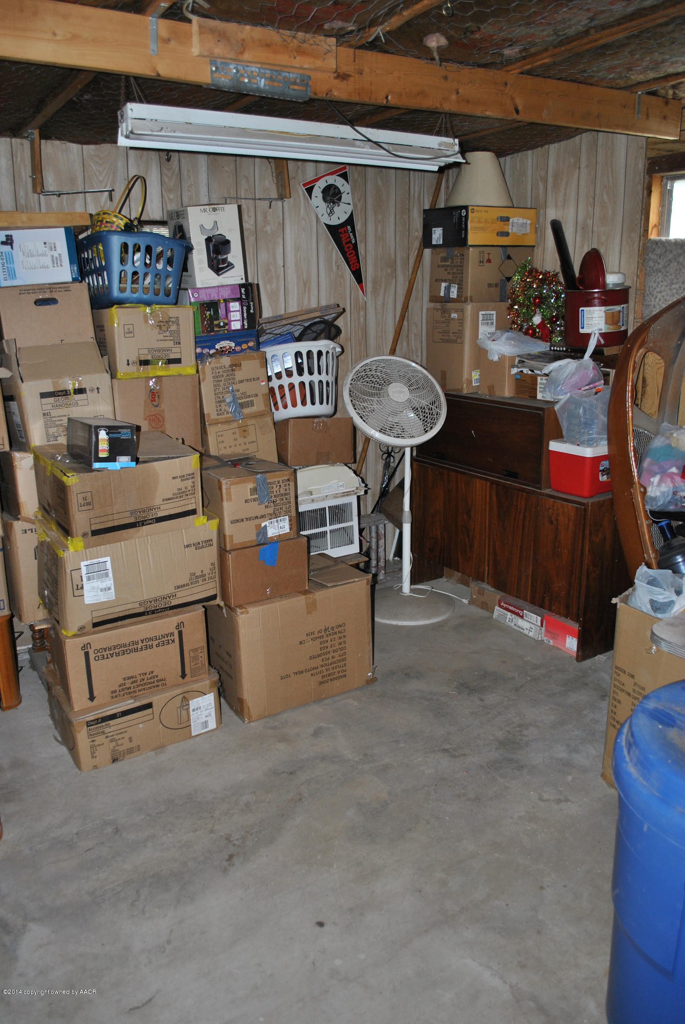 4625 Cline Road Amarillo, TX 79110 - Photo 16 of 16 a room with storage and a table