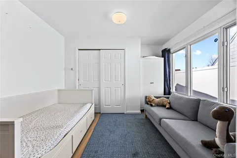 a living room with furniture and a rug