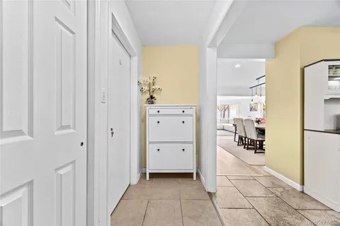 a view of a kitchen with a refrigerator