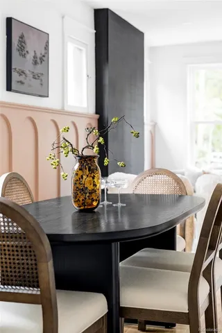 a view of a dining room with furniture