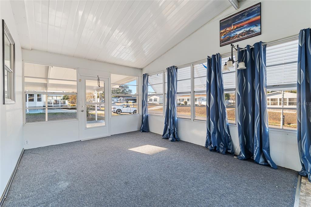 6832 Northeast 3rd Place Ocala, FL 34470 - Photo 44 of 70 a view of an empty room with a window