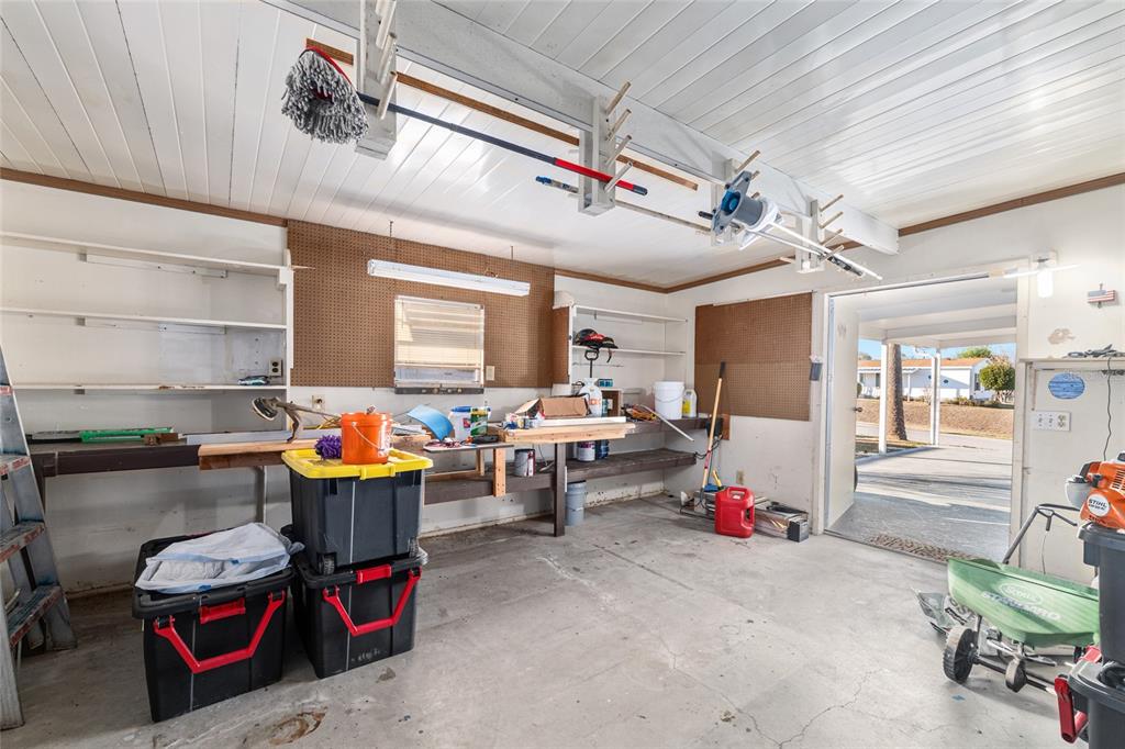 6832 Northeast 3rd Place Ocala, FL 34470 - Photo 47 of 70 a room with furniture and white walls