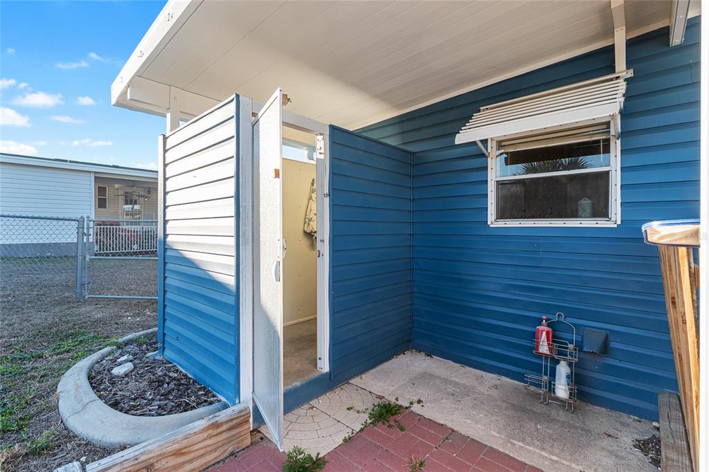 6832 Northeast 3rd Place Ocala, FL 34470 - Photo 49 of 70 a backyard of a house with outdoor seating