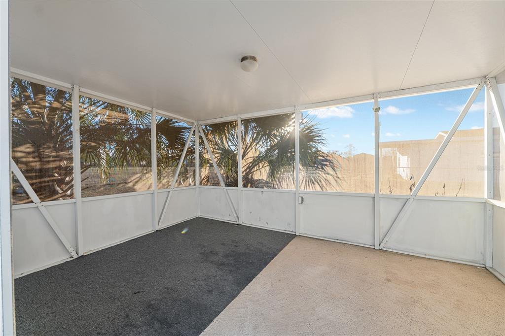 6832 Northeast 3rd Place Ocala, FL 34470 - Photo 57 of 70 a view of an empty room with a window