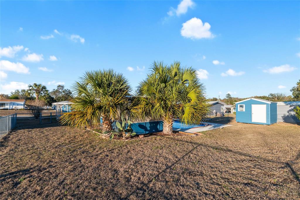 6832 Northeast 3rd Place Ocala, FL 34470 - Photo 60 of 70 a view of a house with a outdoor space