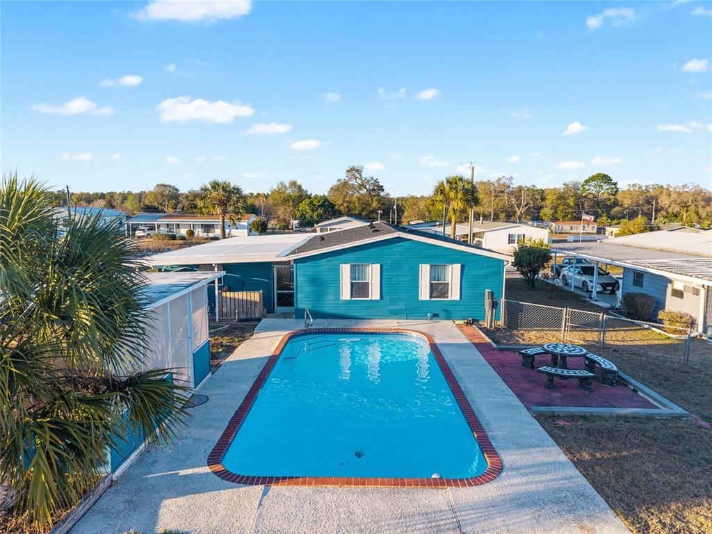 6832 Northeast 3rd Place Ocala, FL 34470 - Photo 66 of 70 a front view of residential houses with yard