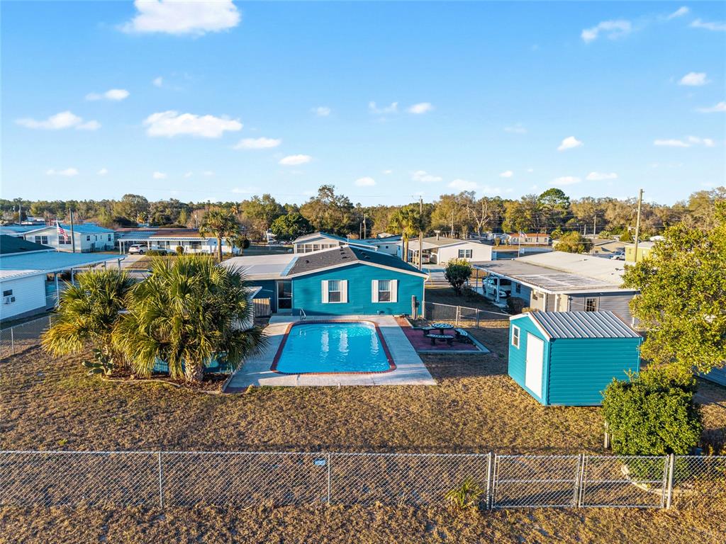 6832 Northeast 3rd Place Ocala, FL 34470 - Photo 67 of 70 a front view of a house with a yard