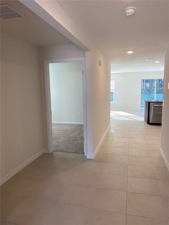 308 Hickory Course Radiel Ocala, FL 34472 - Photo 10 of 24 an empty room with a bathroom